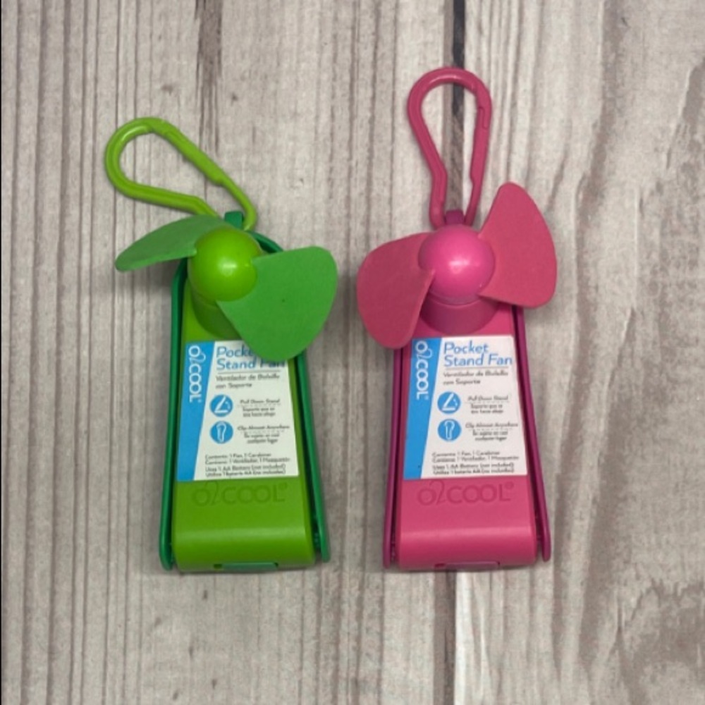 2 O2Cool Pocket Stand Fan With Clip Battery Operated Pink & Green